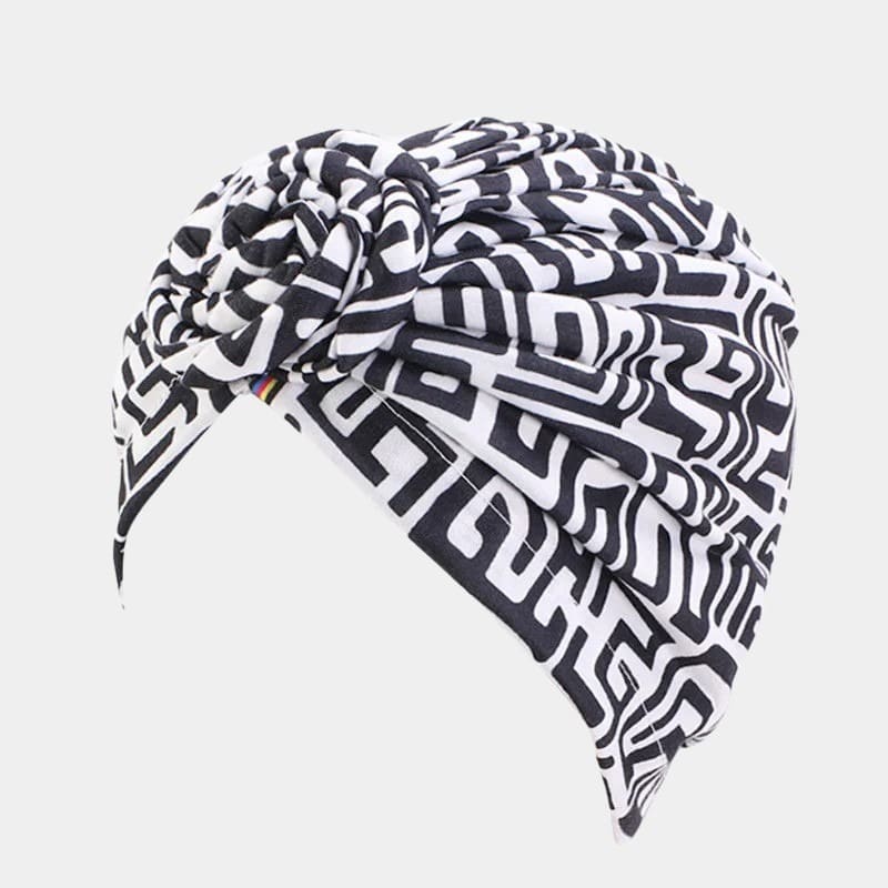 Turban motif africain noir et blanc avec nœud