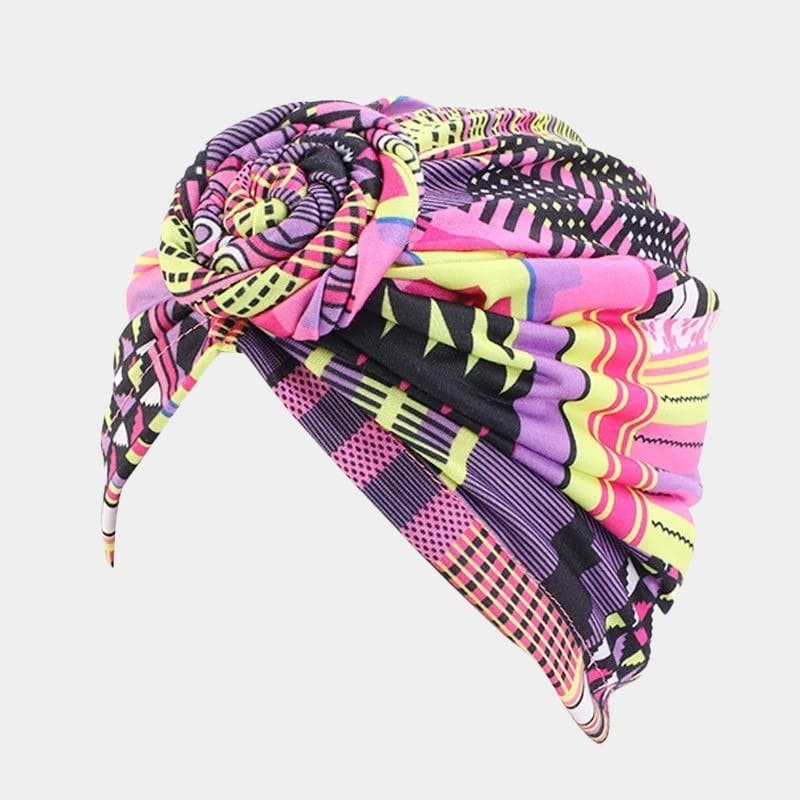Turban motif africain rose avec nœud